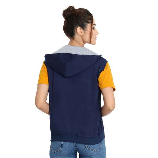 Back view of Model wearing Teemoods Women's Fleece Sleeveless Hooded Sweatshirt with half sleeves tee and jeans.